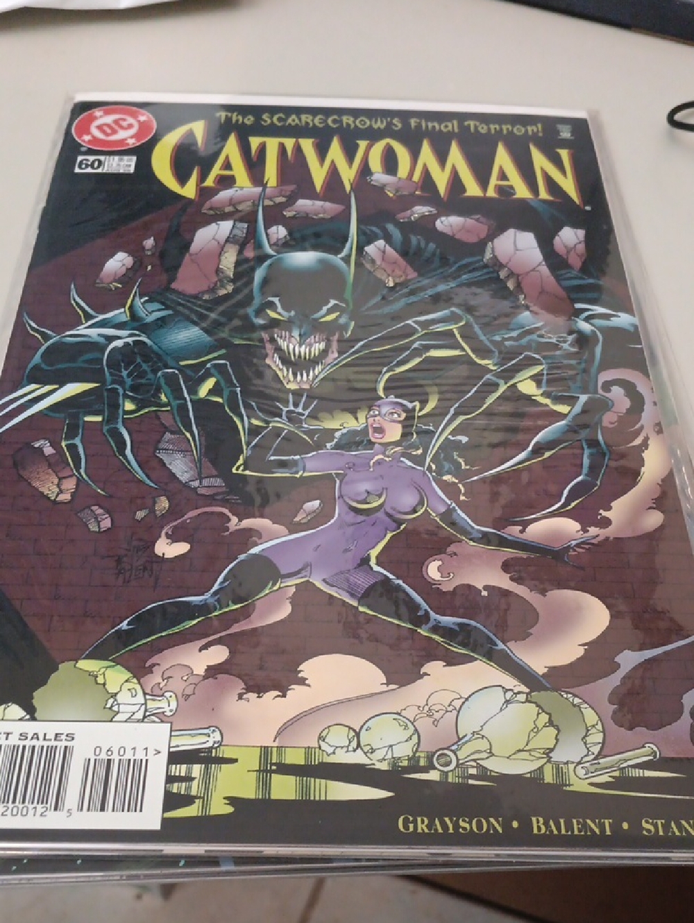 DC Catwoman Comic Book — Purple Suit with Yellow Title